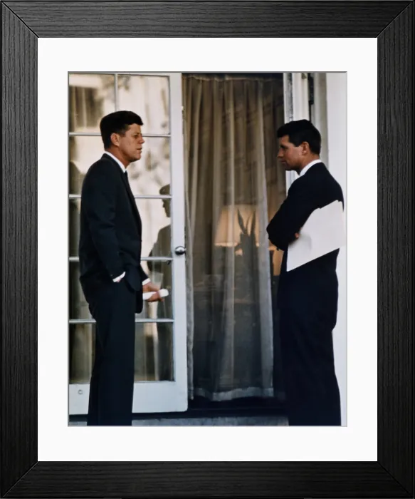 Framed Print : President Kennedy speaking with his brother, Attorney General Robert Kennedy. Ca. 1961-63
