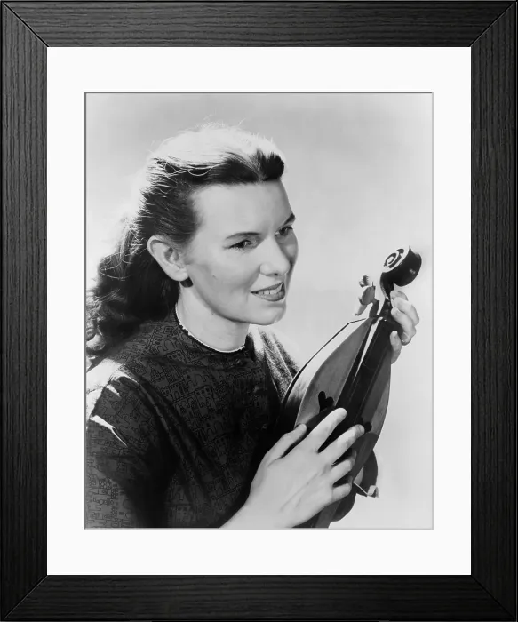 Framed Print : Folk singer, Jean Ritchie, holding an Appalachian dulcimer, an instrument she popularized in the 1950's and 1960's Framed Print : Folk singer, Jean Ritchie, holding an Appalachian dulcimer, an instrument she popularized in the 1950's and 1960's