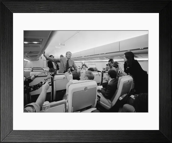 Framed Print : Jimmy Carter holding an informal press conference aboard his plane on a campaign trip. Sept. 11 1976 Framed Print : Jimmy Carter holding an informal press conference aboard his plane on a campaign trip. Sept. 11 1976