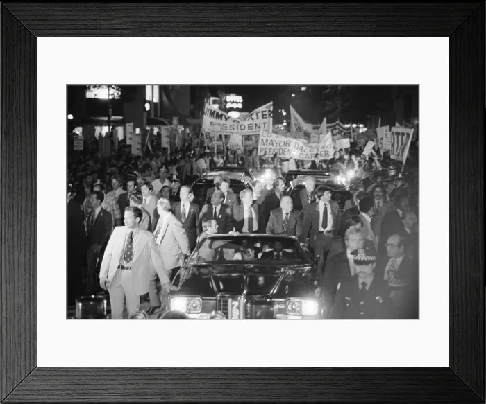 Framed Print : Jimmy Carter and Mayor Richard J. Daley ride in a torchlight parade during a campaign stop in Chicago Illinois. Sept. 9. 1976