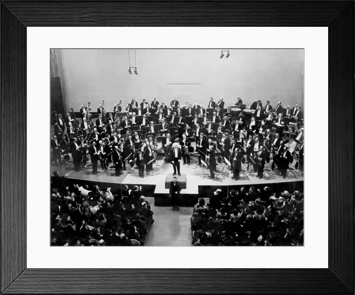 Framed Print : Arturo Toscanini (1867-1957) receives the applause at Radio City on March 5, 1938 at the conclusion of the broadcast of the NBC Symphony Orchestra