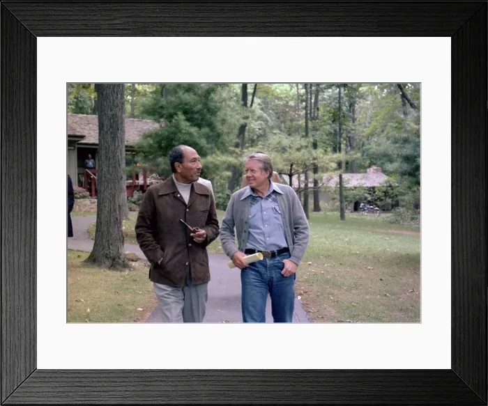 Framed Print : Anwar Sadat and Jimmy Carter walking at Camp David during the summit meeting that resulted in the Camp David Accords. Sept 5-17 1978 Framed Print : Anwar Sadat and Jimmy Carter walking at Camp David during the summit meeting that resulted in the Camp David Accords. Sept 5-17 1978