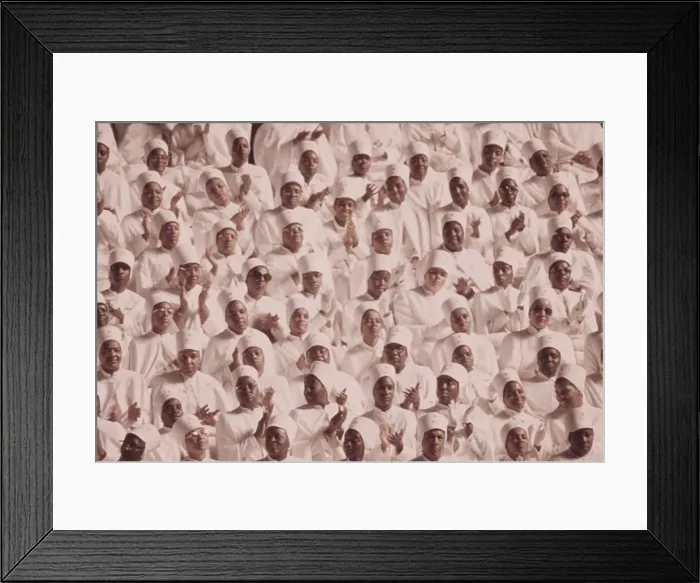 Framed Print : Black Muslim women dressed in white applaud Elijah Muhammad's Annual Savior's Day message. March 1974