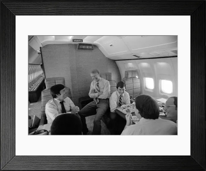 Framed Print : Hamilton Jordan Jimmy Carter and other White House staff aboard Air Force One during the 1980 presidential Campaign against Ronald Reagan