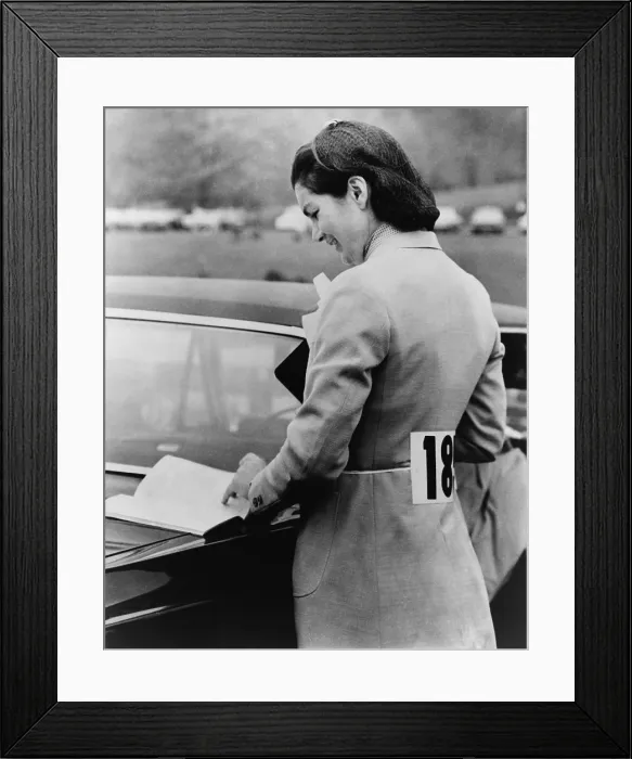 Framed Print : Jacqueline Kennedy, reading book lying on between events at the St. Bernard's school horse show in Gladstone, N.J, May 1966 Framed Print : Jacqueline Kennedy, reading book lying on between events at the St. Bernard's school horse show in Gladstone, N.J, May 1966