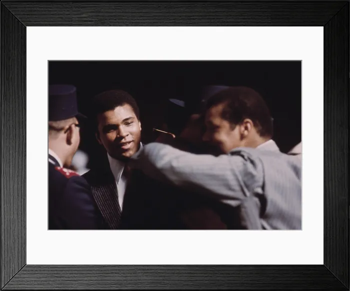 Framed Print : Muhammad Ali talks with fellow Black Muslims in Chicago March 1974
