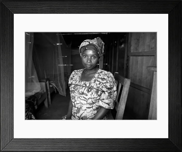 Framed Print : CONGO, Democratic Republic of the. Kitchanga. Democratic Republic of the Congo (2008). Kivu Conflict. Refugee Enriette Kaberatia (32 years old), pregnant after a rape Framed Print : CONGO, Democratic Republic of the. Kitchanga. Democratic Republic of the Congo (2008). Kivu Conflict. Refugee Enriette Kaberatia (32 years old), pregnant after a rape