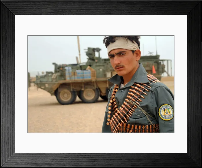 Framed Print : An Afghan National Policeman takes part in a joint patrol with U.S. Infantry in Gavband village Helmand province Afghanistan Feb