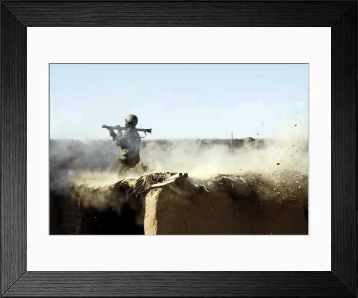 Framed Print : An Afghan National Army soldier fires a rocket-propelled grenade at Taliban insurgents from Marjeh Helmand province. Feb. 9 2011. Photo by:Everett Collection(BSLOC_2011_6_67) Framed Print : An Afghan National Army soldier fires a rocket-propelled grenade at Taliban insurgents from Marjeh Helmand province. Feb. 9 2011. Photo by:Everett Collection(BSLOC_2011_6_67)