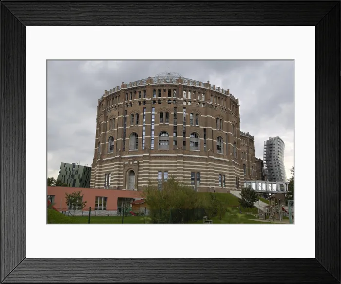 Framed Print : AUSTRIA. Vienna. Gasometer City, old gasometers (1896-1899) transformed into a complex of shops and apartments (1999-2001). AISA / Everett Collection - Image has fine art copyright Framed Print : AUSTRIA. Vienna. Gasometer City, old gasometers (1896-1899) transformed into a complex of shops and apartments (1999-2001). AISA / Everett Collection - Image has fine art copyright