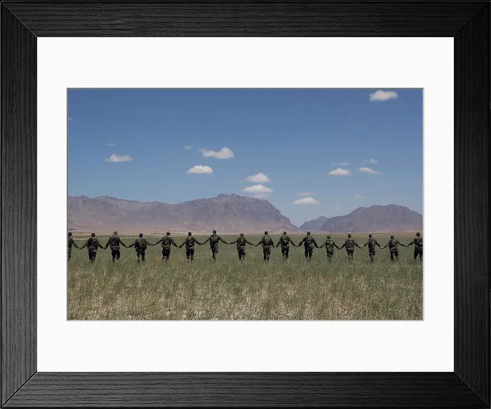 Framed Print : Afghanistan National Army Soldiers form a line while participating in an unexploded ordinance field training exercise conducted by U.S. Army