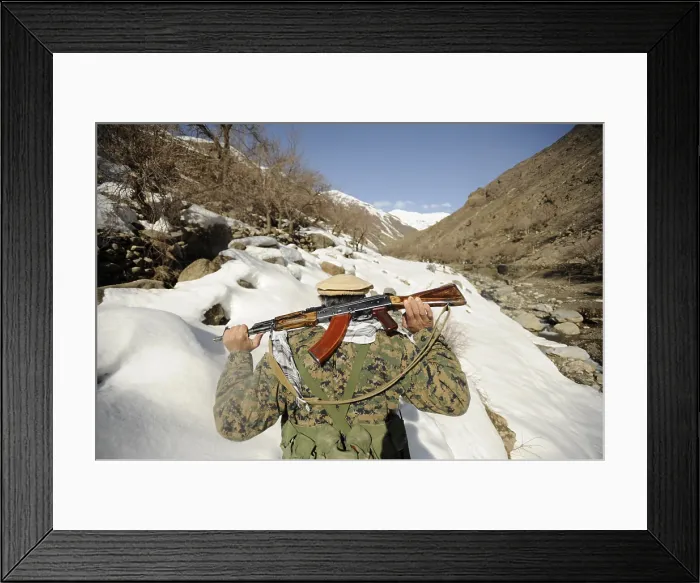 Framed Print : A member of the Mujahadeen Guard walks with U.S. soldiers in Panjshir Valley Afghanistan March 5 2009. Photo by:Everett Collection(BSLOC_2011_6_77)