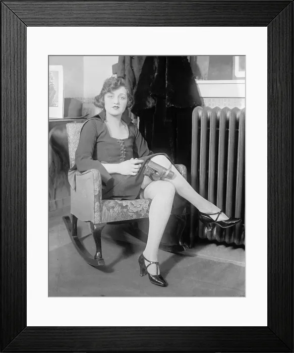 Framed Print : Mary Jayne, a stylish roaring twenties beauty, adds a concealed gun to her wardrobe in 1922