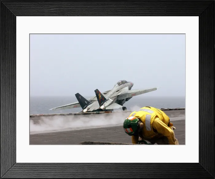 Framed Print : F-14 Tomcat fighter launches from the flight deck of the aircraft carrier USS John F. Kennedy on a combat missions over Afghanistan