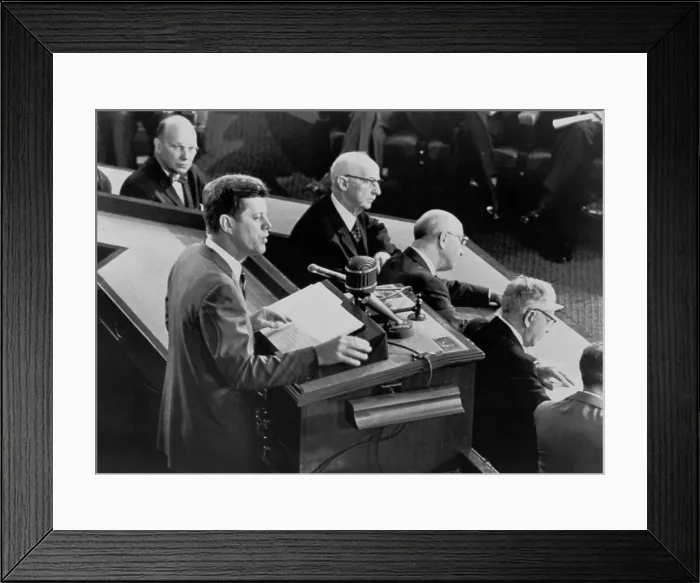 Framed Print : President John Kennedy, addressing a joint session of Congress. He announced his ambitious goal of sending Americans to the Moon before the end of the decade. May 25, 1961
