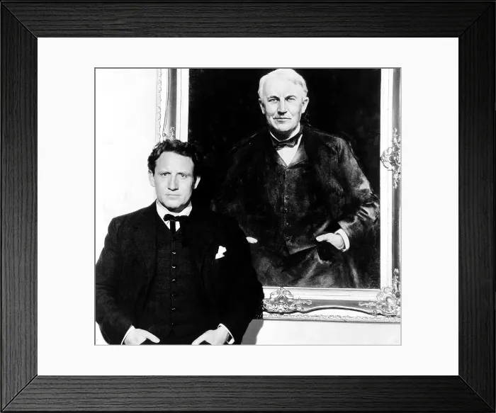 Framed Print : EDISON, THE MAN, Spencer Tracy, on-set with a portrait of Thomas Edison, 1940 Framed Print : EDISON, THE MAN, Spencer Tracy, on-set with a portrait of Thomas Edison, 1940