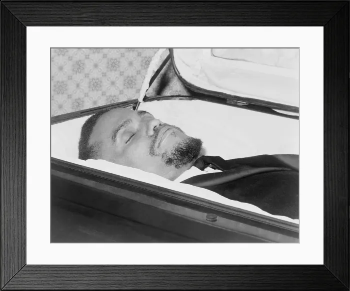 Framed Print : The body of Malcolm X, slain Negro nationalist leader, lies in casket at the Unity Funeral Home