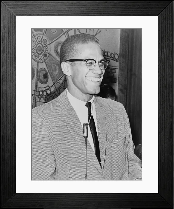 Framed Print : Malcolm X (1925-1965) speaking in 1964, the year he broke with the separatist the Nation of Islam and adopted a more moderate strategy for Black legal and social equality