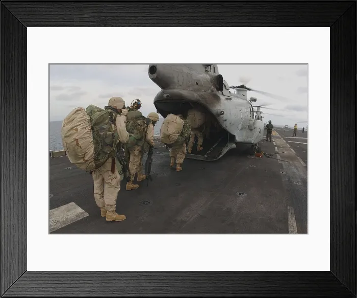 Framed Print : U.S. Marines on the amphibious command ship USS Bataan board a helicopter to be deployed in Afghanistan. Dec. 14 2001. Photo by:Everett Collection(BSLOC_2011_6_26) Framed Print : U.S. Marines on the amphibious command ship USS Bataan board a helicopter to be deployed in Afghanistan. Dec. 14 2001. Photo by:Everett Collection(BSLOC_2011_6_26)