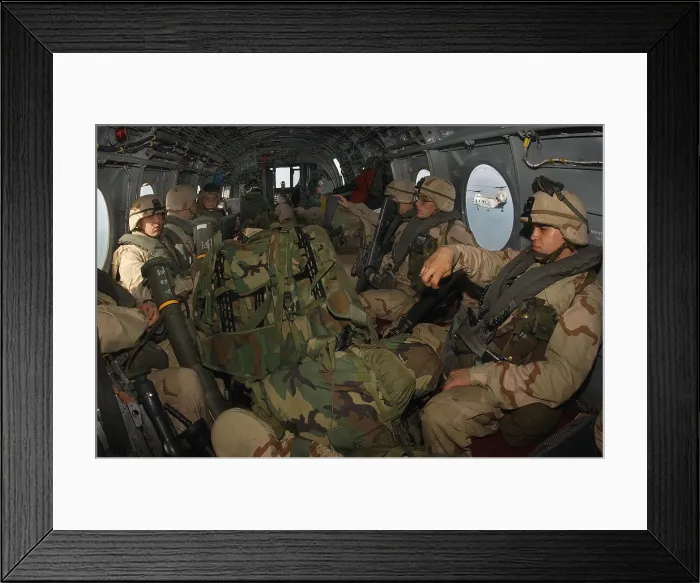 Framed Print : Fully geared U.S. Marines in helicopter about to be deployed in Afghanistan from the amphibious command ship USS Bataan. Dec