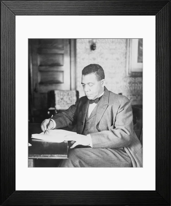 Framed Print : Booker T. Washington (1856-1915), was born a slave in 1856, and worked as a janitor while attending college education at the Hampton Institute in Virginia (1872) Framed Print : Booker T. Washington (1856-1915), was born a slave in 1856, and worked as a janitor while attending college education at the Hampton Institute in Virginia (1872)