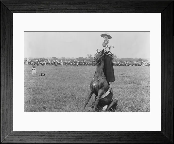 Framed Print : Postcard showing bareback rider and acrobat, Lucille Mullhall, standing on back of horse. 1909 Framed Print : Postcard showing bareback rider and acrobat, Lucille Mullhall, standing on back of horse. 1909