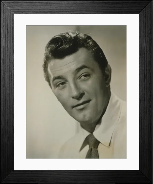 Framed Print : Robert Mitchum (1917-1997), popular American actor in publicity portrait of 1952 Framed Print : Robert Mitchum (1917-1997), popular American actor in publicity portrait of 1952