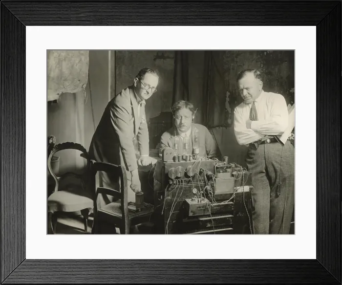 Framed Print : Inventor, Joseph Massolle (center), listening to the first screening of German Movietone News Framed Print : Inventor, Joseph Massolle (center), listening to the first screening of German Movietone News