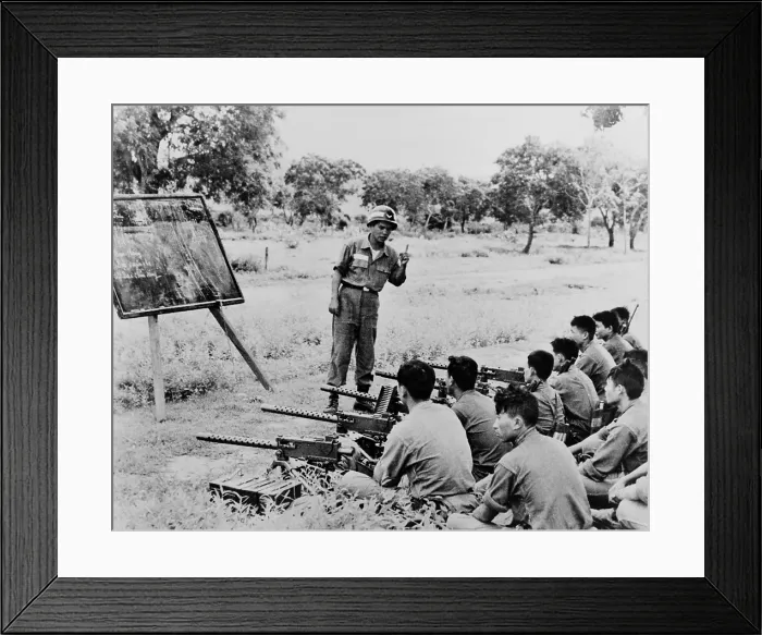 Framed Print : Vietnamese Civil Guard troops receiving training on the use of Browning light machine gun in Song Mao, Vietnam. 1963