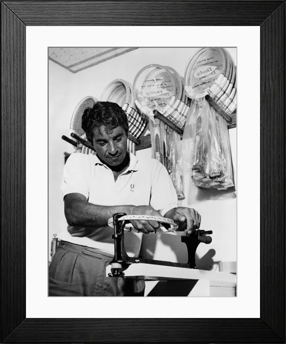Framed Print : Richard Pancho Gonzales restringing a tennis racket in 1962. Gonzales was the World's No. 1 professional tennis player for eight years in the 1950s and early 1960s Framed Print : Richard Pancho Gonzales restringing a tennis racket in 1962. Gonzales was the World's No. 1 professional tennis player for eight years in the 1950s and early 1960s