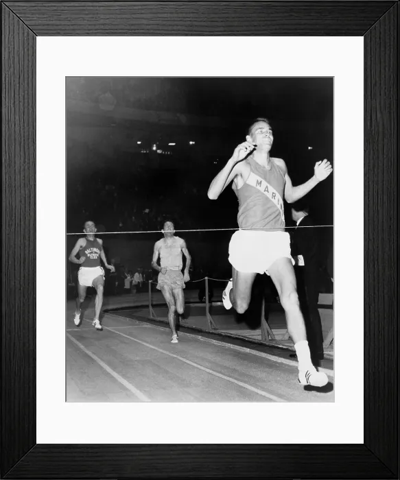 Framed Print : Olympic Champion, Billy Mills, wins the three-mile run at Madison Square Garden in 1965
