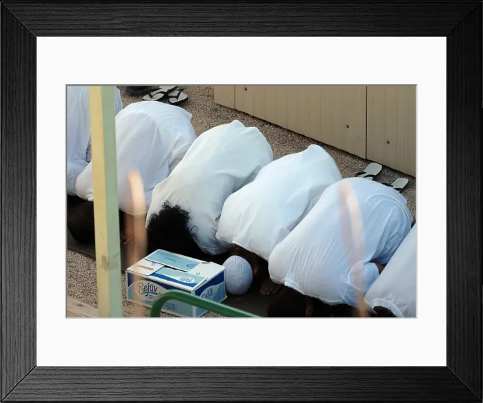 Framed Print : Islamic detainees pray at Camp Delta the military prison at Naval Station Guantanamo Bay Cuba. Jan. 24 2008. Photo by:Everett Collection(BSLOC_2011_6_163) Framed Print : Islamic detainees pray at Camp Delta the military prison at Naval Station Guantanamo Bay Cuba. Jan. 24 2008. Photo by:Everett Collection(BSLOC_2011_6_163)