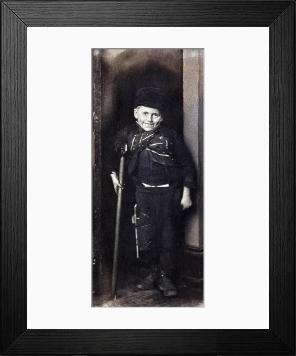 Framed Print : Charles Dickens's character, 'Tiny Tim, ' from the classic 'A Christmas Carol, ' comes to life in photographer Elizabeth B Framed Print : Charles Dickens's character, 'Tiny Tim, ' from the classic 'A Christmas Carol, ' comes to life in photographer Elizabeth B