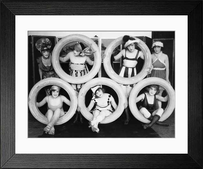 Framed Print : Mack Sennett's 'Smick-Smack' girls in costume posed with tires in 1923 Framed Print : Mack Sennett's 'Smick-Smack' girls in costume posed with tires in 1923
