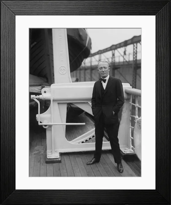 Framed Print : George M. Cohan (1878-1942), poses for photographers on the deck of an ocean liner in the port of New York, ca. 1920