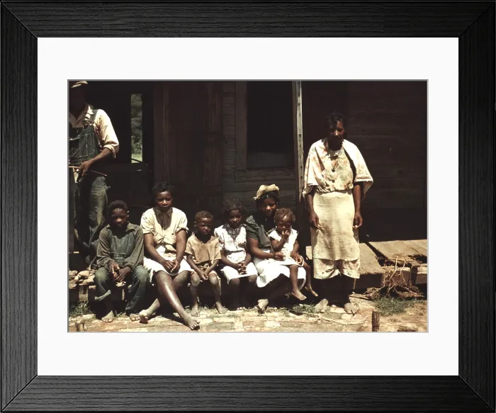Framed Print : A rural African American family seated on the porch of their house on a house Bayou Bourbeau plantation, Natchitoches, Louisiana. 1940