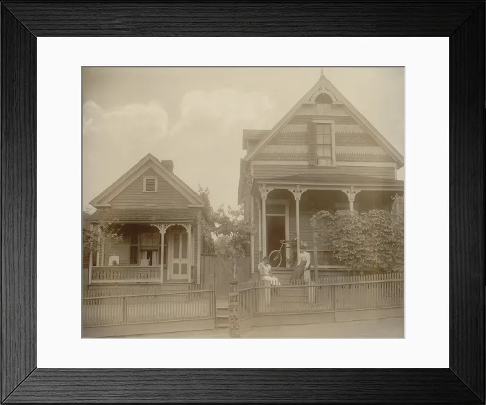 Framed Print : African American middle class neighborhood in Georgia, ca. 1899. Women and children are seated on their the porches and steps of their stylish homes