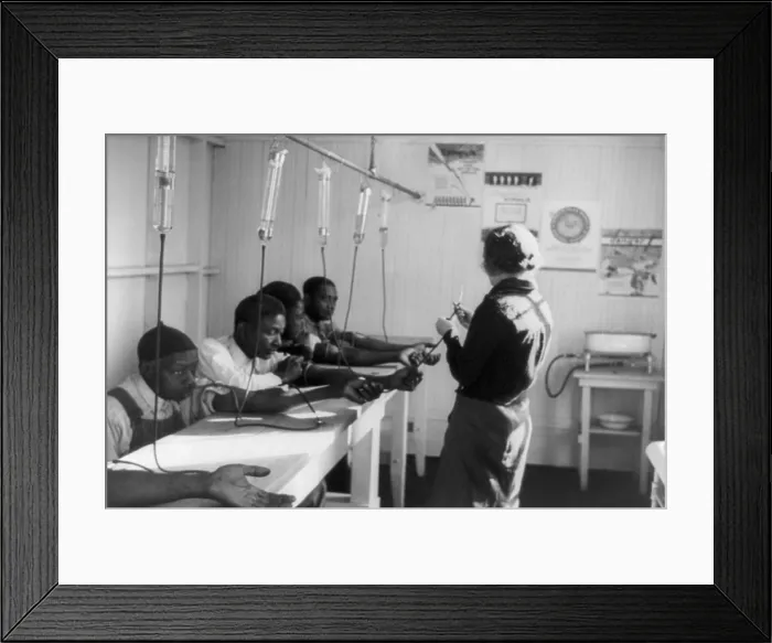Framed Print : A group of African American men receiving intravenous treatment in a Georgia venereal disease clinic. ca. 1937 Framed Print : A group of African American men receiving intravenous treatment in a Georgia venereal disease clinic. ca. 1937