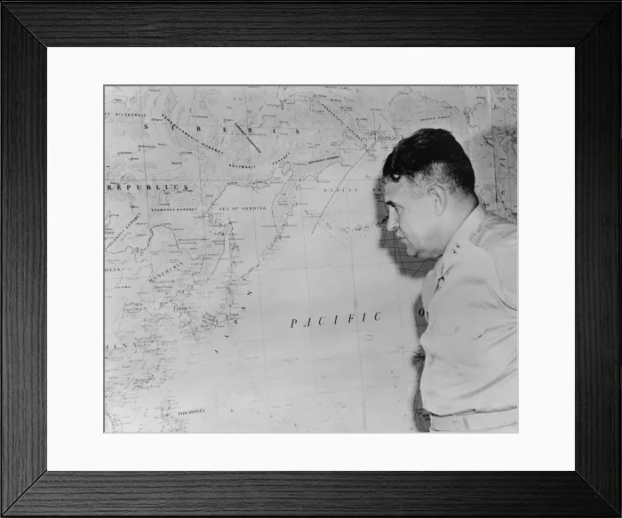 Framed Print : Major General Leslie Richard Groves, viewing a wall map of coastal East Asia and Japan, after the first use of the Atomic bomb against civilian targets in Hiroshima and Nagasaki