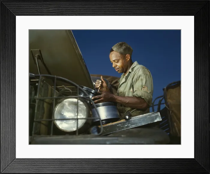 Framed Print : African American soldier, a truck driver and mechanic, was one of thousands of Blacks relegated to support roles in the segregated U.S. armed forces during World War II