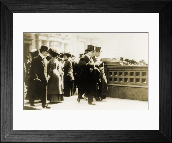 Framed Print : John Davison Rockefeller (1839-1937), walking with his son John D. Jr. in New York as onlookers watch the pair. Ca. 1910