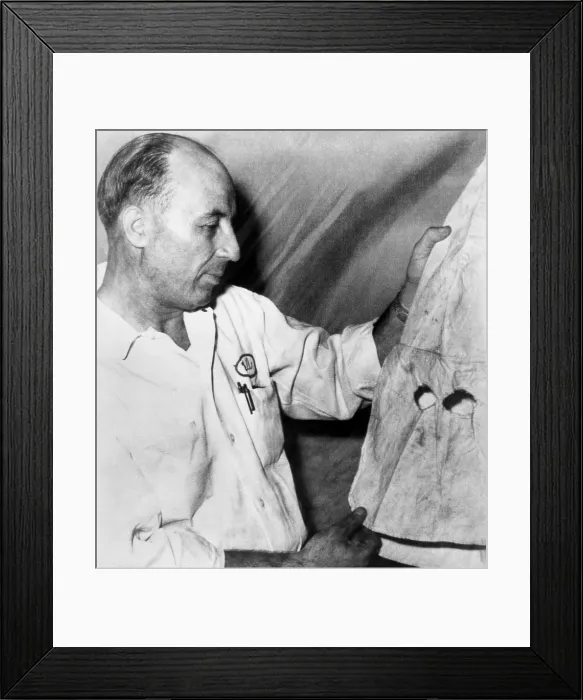 Framed Print : Supreme Court Justice Hugo Black's KKK costume. Ku Klux Klan Cyclops, Bill Chappel, holds a hood he claimed was worn by Hugo Black when he belonged to the Klan in the 1920s Framed Print : Supreme Court Justice Hugo Black's KKK costume. Ku Klux Klan Cyclops, Bill Chappel, holds a hood he claimed was worn by Hugo Black when he belonged to the Klan in the 1920s