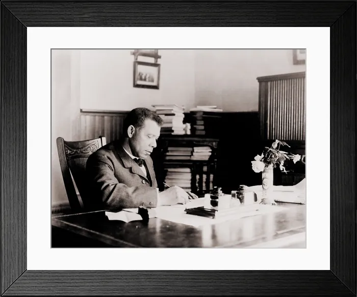Framed Print : Booker T. Washington (1856-1915), writing at his desk. His autobiography, UP FROM SLAVERY, 1901, was a best seller Framed Print : Booker T. Washington (1856-1915), writing at his desk. His autobiography, UP FROM SLAVERY, 1901, was a best seller