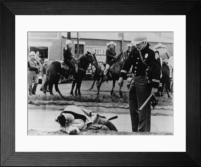 Framed Print : Alabama State Trooper stands over an injured protester on Bloody Sunday in Selma, Alabama
