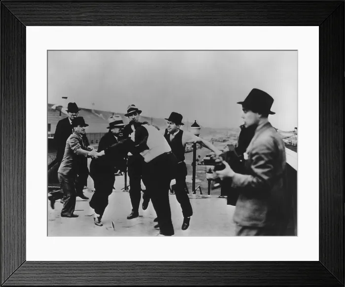 Framed Print : Battle of the Overpass at Ford River Rouge plant. Ford thugs vs. UAW. May 1937. Ford's thugs beat Richard Frankenstein after pulling his jacket over his head