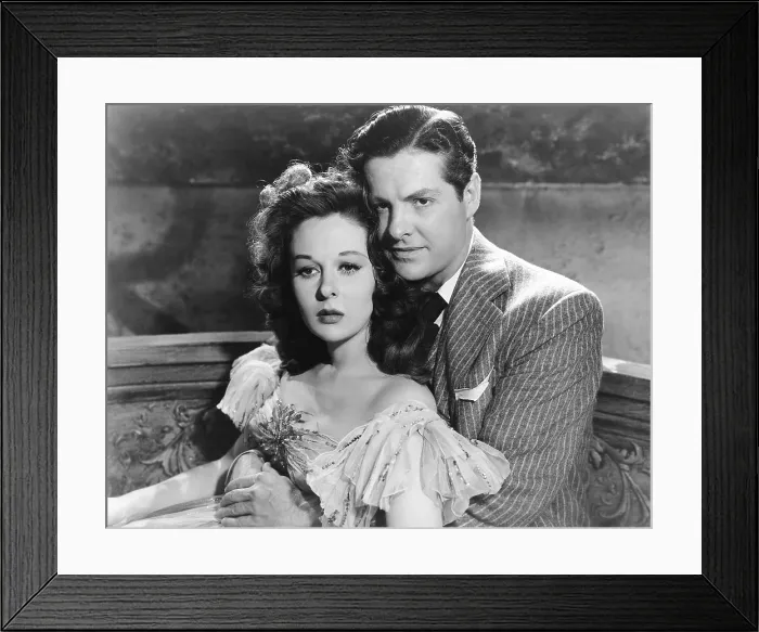 Framed Print : THE LOST MOMENT, from left: Susan Hayward, Robert Cummings, 1947
