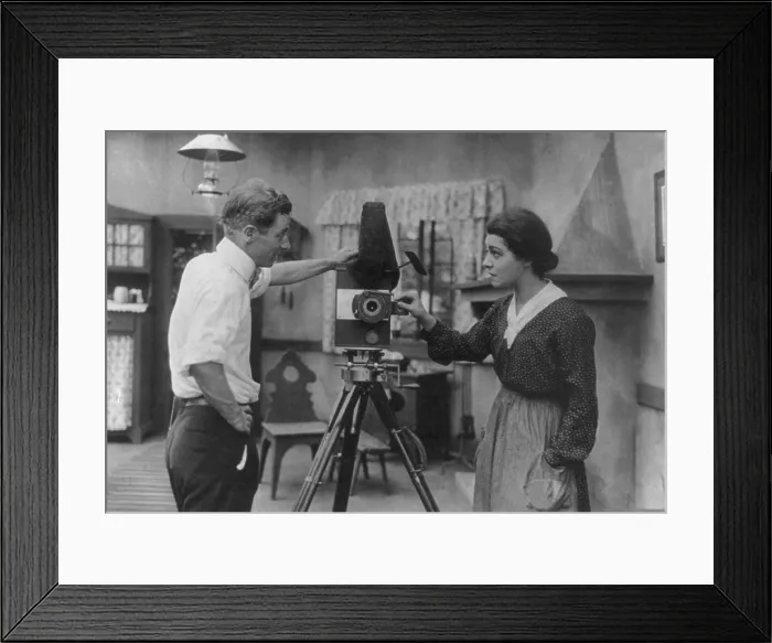 Framed Print : Alla Nazimova, (1879-1945), Ukrainian born American actress with director Herbert Brenon (1880-1958) talking near a movie camera. 1916 Framed Print : Alla Nazimova, (1879-1945), Ukrainian born American actress with director Herbert Brenon (1880-1958) talking near a movie camera. 1916