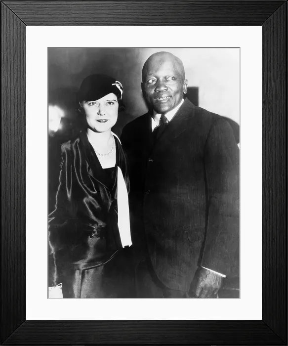 Framed Print : Former heavyweight boxing champion, Jack Johnson, with his fourth wife, the former Irene Pineau, at the opening of his night club, The Showboat, Los Angeles, California Framed Print : Former heavyweight boxing champion, Jack Johnson, with his fourth wife, the former Irene Pineau, at the opening of his night club, The Showboat, Los Angeles, California