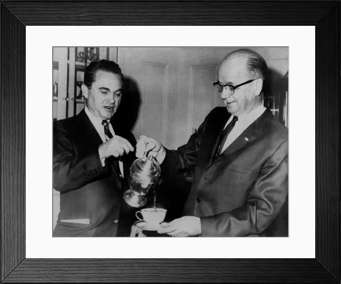 Framed Print : Segregationist governors Lester Maddox and George Wallace. Maddox pours a cup of coffee for former Alabama governor George Wallace at the governor's mansion in Atlanta