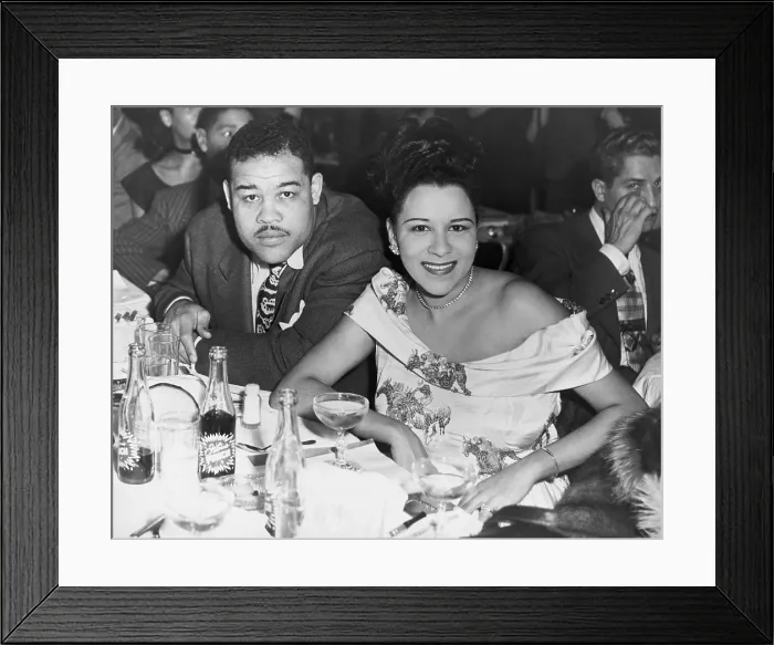 Framed Print : Heavyweight champ Joe Louis and his first wife Marva dining at a night club in 1947 Framed Print : Heavyweight champ Joe Louis and his first wife Marva dining at a night club in 1947